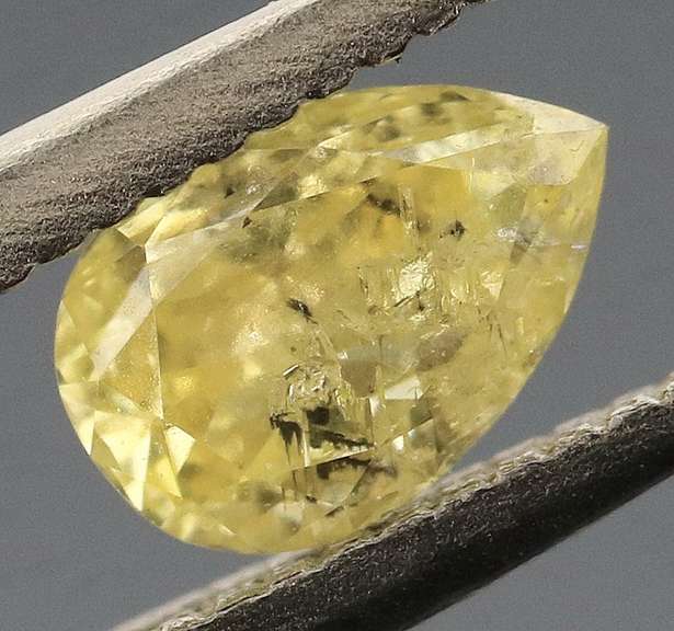 Pear cut .25ct canary yellow Diamond
