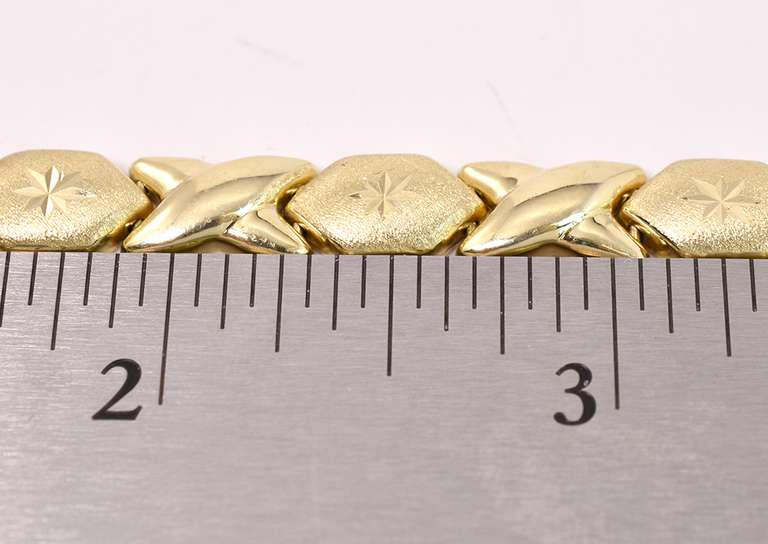 Beautiful XO Style Bracelet in 14K Yellow Gold