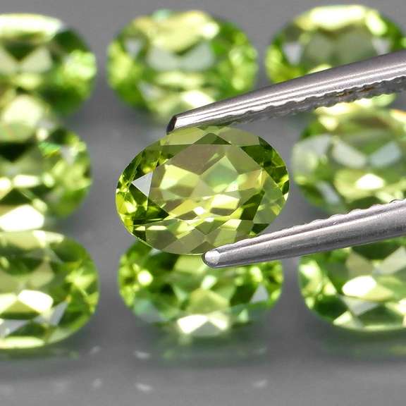 Awesome 7.26ct untreated apple green Peridot set