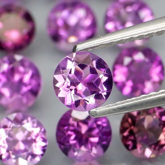 Glittering 7.12ct round cut Bolivian Amethyst set