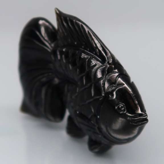 Simply adorable 50.82ct Tektite fish carving