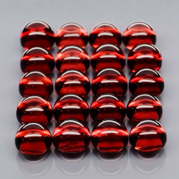 Incredible 8.62ct open color Mozambique Garnet cabochon set