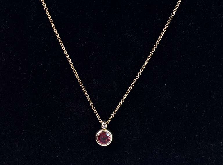 Brilliant Bezel Garnet Pendant Necklace in 14K Yellow Gold