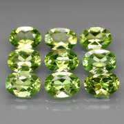 Awesome 7.26ct untreated apple green Peridot set