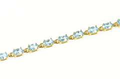 10K Yellow Gold Oval Blue Topaz Classic Statement Tennis Bracelet
