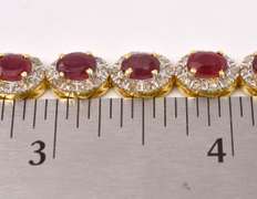 Fabulous 12.35CTW Oval Cut Ruby & 3.50CTW Diamond Tennis Bracelet in Gold Plated Sterling Silver