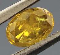 Eye catching .24ct oval cut golden Diamond