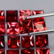 Premium cut set of 16 top red VS Garnets weighing 7.55 carats