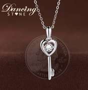 Elegant heart key pendant with center Stone dancing