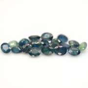 Heated only! 9.56ct blue green Sapphire set