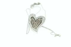 14KT GOLD HEART PENDANT/W WHITE AND CHOCOLATE DIAMONDS.
