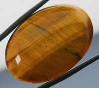 Mezmerizing 37.22ct Tigers Eye cabochon