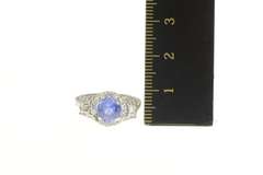 Platinum 1.55 Ctw Tanzanite Diamond Halo Engagement Ring