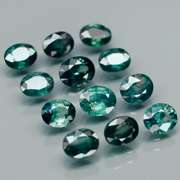 Heated only! 6.25ct blue green sapphire set