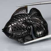 Simply adorable 50.82ct Tektite fish carving