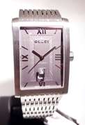 Gucci men's wristwatch 8600M Automatic Swiss Made NEW with tags box and papers
