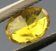 Eye catching .24ct oval cut golden Diamond