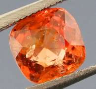 Incredible .86ct open color blood orange Spinel