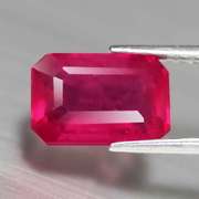Gorgeous 3.47ct emerald cut Ruby center stone