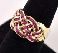 Lovely Ruby Braid Style Ring in Yellow Gold