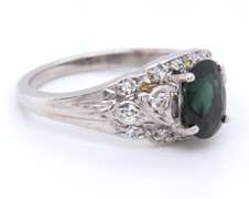 Vintage White Gold oval Green Sapphire and Single Cut Diamond Ring