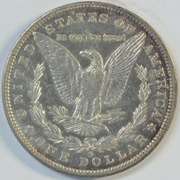 Lustrous original AU 1887-S Morgan Silver Dollar. Better date