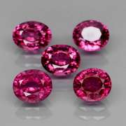 Amazing 4.97ct oval cut violet pink Garnet set