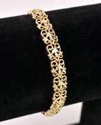 Ornate Fancy Link Braceelet in Yellow Gold