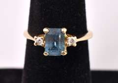 Elegant Blue Topaz and Diamond Ring in 14K Yellow Gold