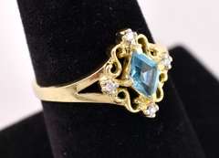 Brilliant Blue Topaz and Diamond Ring in 14K Yellow Gold