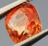 Incredible .86ct open color blood orange Spinel