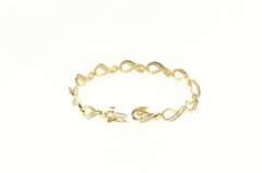 10K Yellow Gold Baguette Diamond Wavy Curvy Link Tennis Bracelet