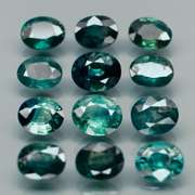 Heated only! 6.25ct blue green sapphire set