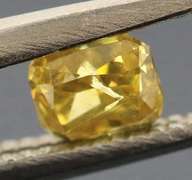 Eye catching .23ct cushion cut golden Diamond