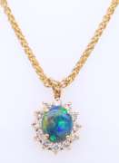 Pleasing Yellow Gold Oval Opal and Diamond Pendant on Wheat Chain