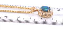 Pleasing Yellow Gold Oval Opal and Diamond Pendant on Wheat Chain