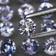 Heavy flashing 5.20ct diamond cut Tanzanite set