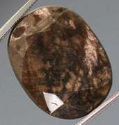 Huge untreated 23.30ct earth toned faceted Sapphire