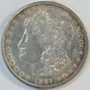 Lustrous original AU 1887-S Morgan Silver Dollar. Better date