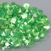 Tremendous 3.92ct untreated spring green Tsavorite set
