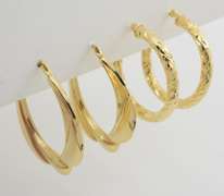 Two Pairs of Gold Hoop Earrings