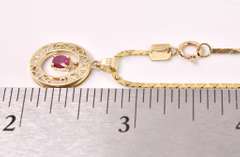 Elegant Ruby and Diamond Pendant Necklace in 14K Yellow Gold
