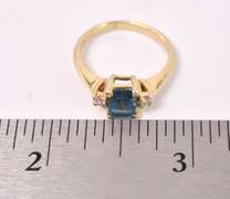 Elegant Blue Topaz and Diamond Ring in 14K Yellow Gold