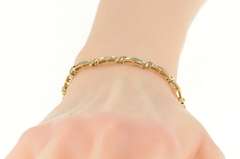 10K Yellow Gold 1.00 Ctw Baguette Diamond Oval Link Tennis Bracelet