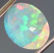 Captivating 1.70ct fully faceted fairy fire jelly Opal