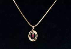 Elegant Ruby and Diamond Pendant Necklace in 14K Yellow Gold