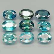 Stunning blue green 6.94ct Sapphire set