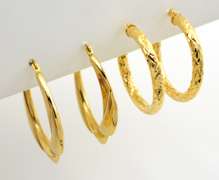 Two Pairs of Gold Hoop Earrings