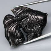 Simply adorable 50.82ct Tektite fish carving