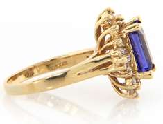 3.16ct Emerald Cut Tanzanite and 1.00ctw Diamond Starburst Yellow Gold Ring